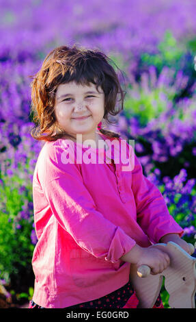 Small girl (4-5) in lavender field Stock Photo