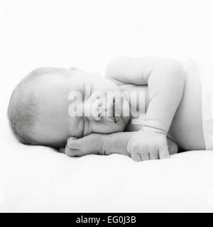 Close-up of newborn baby girl sleeping Stock Photo