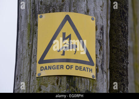 Danger of death sign on electricity pylon Stock Photo