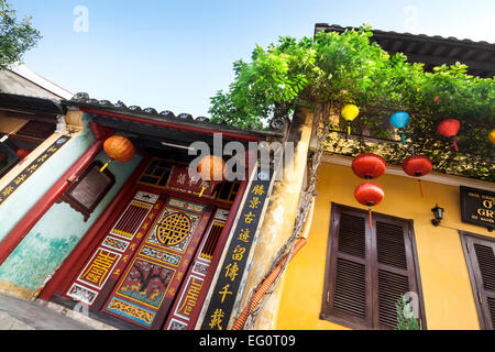 Street scene at old district in Hoi An Ancient town, Vietnam. Chinese family temple. Stock Photo