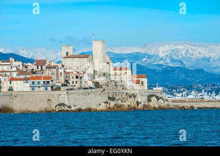 View over Antibes old town and snow-covered Alpes, Alpes-Maritimes Department, Cote d’Azur, France Stock Photo