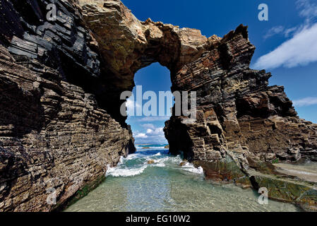 Spain, Galicia: Impressing rock arcade at Cathedral´s beach Stock Photo