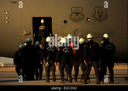 Members from the Virginia Task Force 2 Urban Search and Rescue board a ...