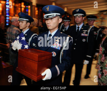 U.S. Air Force Academy, CO -- Major Robert Bonner  carries the remains of Lt. Gen. A.P. Clark after a funeral mass held Mar. 17, 2010 in the Cadet Chapel.  Lt. Gen Clark, who was the Academy's sixth superintendent from Aug 1, 1970 to July 31, 1974, was a 1936 graduate of West Point and went on to a flying career after graduation.  He spent 33 months as a prisoner of war after getting shot down over Abbeville, France in July 1942, flying a British Spitfire.  His post-World War II assignments includes staff positions at Tactical Air Command, Continental Air Command, Air Defense Command and Air F Stock Photo