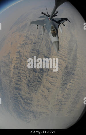 A U.S. Air Force F-16 Fighting Falcon from the 510th Expeditionary Fighter Squadron EFS receives fuel from a KC-135 Stratotanker while flying over Afghanistan in support of Operation Enduring Freedom, Sept. 30, 2010.  The pilots of the 510th EFS are deployed from Aviano Air Base, Italy.  Staff Sgt. Eric Harris Stock Photo