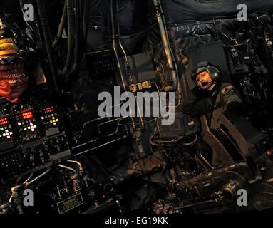 U.S. Air Force AC-130U gunship aerial gunner Staff Sgt. Sarah Mrak from the 4th Special Operations Squadron mans the 40 mm gun Feb. 3, 2011, during a local training mission at Hurlburt Field, Fla. The AC-130U &quot;Spooky&quot; gunship is the primary weapon of Air Force Special Operations Command. Its primary missions are close air support, air interdiction and armed reconnaissance. The U model is an upgraded version of the H and is equipped with side firing, trainable 25 mm, 40 mm, and 105 mm guns.  Master Sgt. Jeremy T. Lock Stock Photo