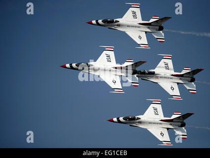The US Air Force Thunderbird demonstration team performs in their F-16 C/D Fighting Falcons at the Charleston Air Expo, Joint Base Charleston S.C., 9 April 2011.  The Thunderbirds closed the 2011 Charleston Air Expo in dramatic fashion as they dazzled  an expected crowd of 100,000 people.   Airman 1st Class James Richardson Released Stock Photo