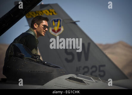U.S. Air Force Capt. Jeremy Nolting, F-16 pilot, 79th Fighter Squadron, Shaw Air Force Base, S.C., sits on the edge of the cockpit of an F-16 Fighting Falcon during exercise Green Flag West 11-6 at Nellis Air Force Base, Nev., April 20, 2011. Green Flag West replicates irregular warfare conditions currently found in Southwest Asia. Aircrews work closely with Air Force joint terminal attack controllers. Pilots train for a mission such as close air support and aerial reconnaissance.  Senior Airman Brett Clashman