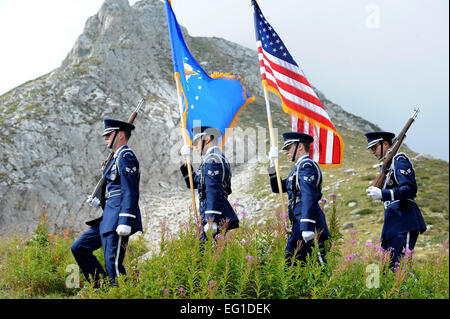 The Honor guard posts the colors before the Commemoration Ceremonies for the B-17 of the Aguille des Glaciers, September 3, Courmayeur, Italy.  Lt. Col. Rebecca Sonkiss, commander, 15 Airlift Squadron and 12 others from Joint Base Charleston participated in two commemoration ceremonies for the crew of B-17 #43-39388 in Courmayeur, Italy and Bourg Saint Maurice on September 3rd and 4th.   The B-17 crew was from the 15th Troop Carrier Squadron which is now the 15th AS.  Dignitaries and family members of the crew were in attendance. The entire eight man crew was lost after their aircraft went dow Stock Photo
