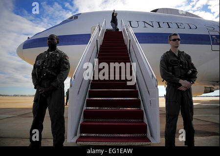 Secretary of Defense Leon E. Panetta, at top of stairs, waves as he boards a U.S. Air Force E-4B National Airborne Operations Center aircraft at Joint Base Andrews, Md., Oct. 21, 2011. Panetta departed the base to visit defense leaders and U.S. troops stationed in the Asia-Pacific region. DoD photo by Tech. Sgt. Jacob N. Bailey, U.S. Air Force Stock Photo