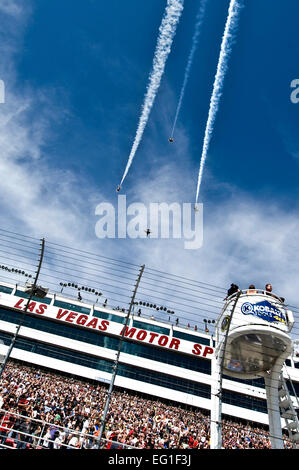 The U.S. Air Force Air Demonstration Squadron, the Thunderbirds, fly over the Las Vegas Motor Speedway during the opening ceremonies of the NASCAR Sprint Cup Series Kobalt Tools 400 race March 11, 2012. This year marks the 30th season the squadron has performed in the U.S. Air Force F-16 Fighting Falcon, the Air Force's premier multi-role fighter aircraft.  Airman 1st Class Daniel Hughes Stock Photo