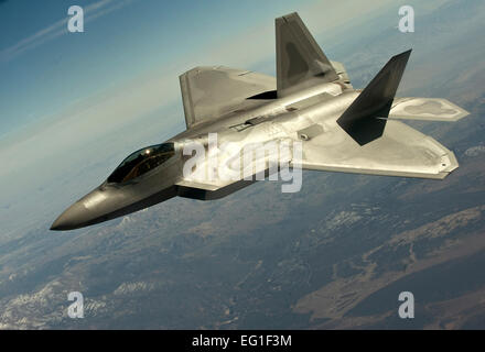 A U.S. Air Force F-22 Raptor fighter aircraft flies in a training mission during Red Flag 12-3 over the Nevada Test and Training Range March 13, 2012. The exercise allows Airmen to experience intensive air combat operations in the safety of a training environment. The F-22 belongs to the 1st Fighter Wing out of Langley Air Force Base, Va.  Staff Sgt. Christopher Hubenthal Stock Photo