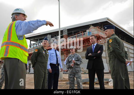 Undersecretary of the Air Force Eric Fanning is briefed by Craig Killmer during a tour of the Academic Training Center construction site on March 14, 2014, at Luke Air Force Base, Ariz. The 145,000 square-foot facility will include pilot academic training classrooms, 12 F-35 simulators, a secured briefing auditorium, and space for administrative, instructor and engineering personnel. Killmer is the Archer Western Contractors project manager. Staff Sgt. Darlene Seltmann Stock Photo