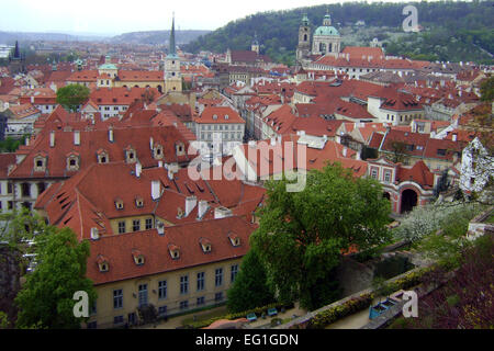 PRAGUE, CZECH REPUBLIC - APRIL 26. View of the rooftops of the old and well-preserved city of Prague. Stock Photo