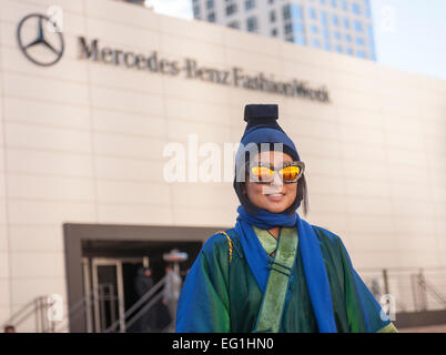 New York, USA. 13th Feb, 2015. Fashionistas brave the frigid weather wearing their fashionable winter clothing outside the Fall 2015 Fashion Week shows in Lincoln Center in New York on Friday, February 13, 2015. The day started off in the single digits reaching the mid-teens and Sunday is expected to go down to zero, the coldest day in the city in 20 years. This is the last time the shows will be at Lincoln Center as they were booted after a lawsuit was won about them denying use of the park to the public. A new venue has not been determined yet. Credit:  Richard Levine/Alamy Live News Stock Photo