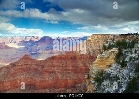 Beautiful Grand Canyon in the winter with snow falling in the distance. Stock Photo