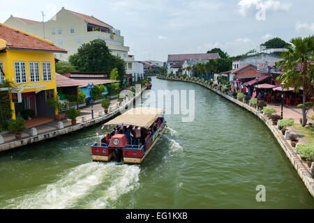 A boat on the Malacca River which flows through Malacca town, Malaysia. Stock Photo