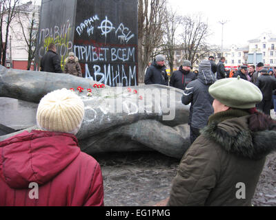 thrown big bronze monument to Lenin the leader of world proletariat in Chernihiv Stock Photo