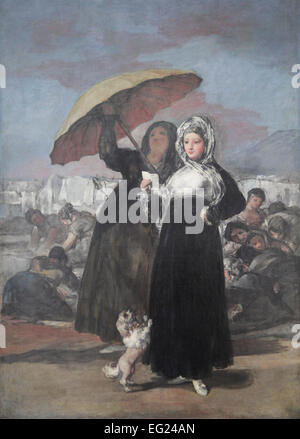 Young Woman Reading Letter by Francisco de Goya y Lucientes.(1746-1828).Elegant young woman reading a love letter while her maid holds a parasol. Stock Photo