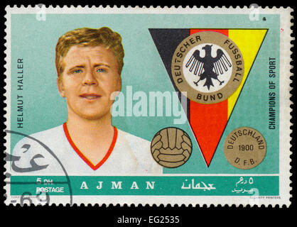 AJMAN - CIRCA 1969: a postage stamp printed in Ajman one of the emirares of the United Arab Emirates showing an image of Helmut  Stock Photo