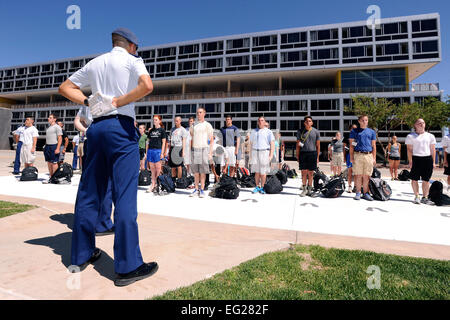 U.S. Air Force Academy cadet cadre members survey a group of basic cadets on the footprints during the Class of 2017 Inprocessing Day June 27, 2013, at the U.S. Air Force Academy in Colorado Springs, Colo. Cadets are exposed to a balanced curriculum that provides a general and professional foundation essential to a career Air Force officer.   Sarah Chambers Stock Photo