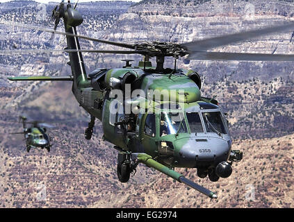 HH-60G Pave Hawk Primary function: Combat search and rescue. Speed: 160 mph. Dimensions: Length 64 ft. 8 in.; width 7 ft. 9 in.; height 16 ft. 8 in.; rotor diameter 53 ft. 7 in. Range: 478 miles unrefueled. Armament: Combi- nation of two 7.62 mm miniguns or .50 caliber machine guns. Crew: Four.  Staff Sgt. Aaron D. Allmon II Stock Photo