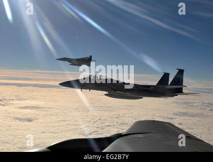 Two F-15C Eagles from the 48th Fighter Wing prepare to return to their simulated air combat portion of the Arctic Challenge exercise Sept. 20, 2013, over Norway. Six nations participated in the exercise to boost interoperability between NATO, the U.S., the United Kingdom and members of the Nordic Defense Cooperation. 1st Lt. Christopher Mesnard Stock Photo