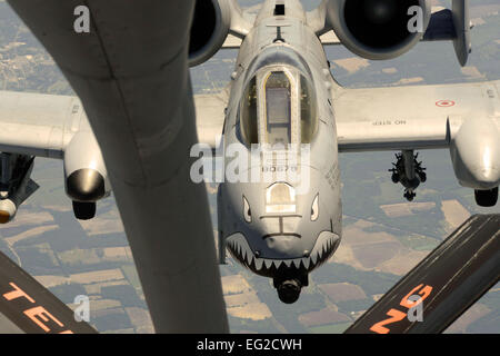 An A-10 Thunderbolt II lines up to take on fuel from a KC-135R Stratotanker during a refueling mission April 22, 2014. The A-10 is assigned to the 23rd Fighter Group at Moody Air Force Base, Ga. The KC-135R is from the 134th Air Refueling Wing at McGhee Tyson Air National Guard Base, Tenn.  Master Sgt. Kendra M. Owenby Stock Photo