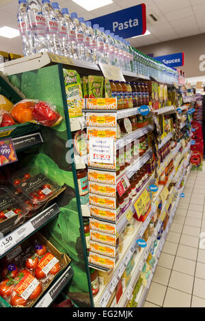 Tesco Express convenience store food shelves Stock Photo