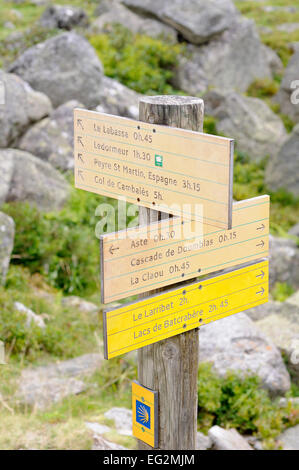 Signpost for directions to various places on Val du Tech, Pyrenees National Park, Hautes-Pyrenees, France. Stock Photo