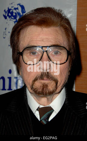 File. 14th Feb, 2015. GARY OWENS (May 10, 1934 - February 12, 2015), the man behind the smooth baritone best known for announcing 'Rowan and Martin's Laugh-In' in the late 1960s, has died at 80. Owens hosted thousands of radio programs over his seven-decade career. He appeared in more than a dozen movies and on scores of TV shows, including Lucille Ball and Bob Hope specials. He also voiced hundreds of animated characters, recorded a comedy album and wrote two books. Owens is survived by his wife of 57 years, Arleta, and their sons, Scott and Chris. Pictured - 2009 - Los Angeles - Gary Ow Stock Photo