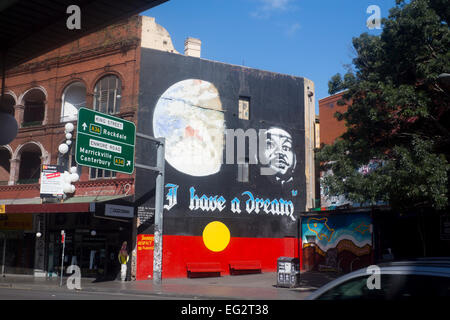Martin Luther King 'I Have a Dream' mural on Aboriginal flag background King Street Newtown Sydney New South Wales NSW Australia