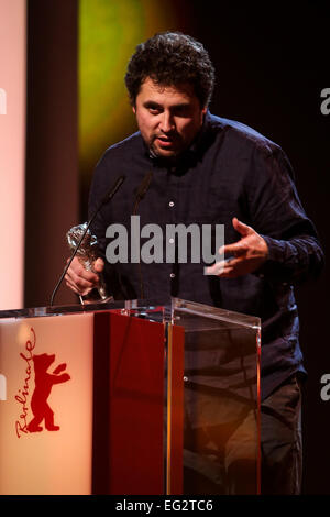 Berlin, Germany. 14th Feb, 2015. Radu Jude holds his Silver Bear for th Best Director for the film 'Aferim' during the award ceremony at the 65th Berlinale International Film Festival in Berlin, Germany, Feb. 14, 2015. Credit:  Zhang Fan/Xinhua/Alamy Live News Stock Photo