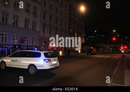 Copenhagen, Denmark. 15th Feb, 2015. A police vehicle parks near the site of shooting in Copenhagen, Denmark, early Feb. 15, 2015. A shooting occurred near Norreport subway station early Sunday, injuring three people including two policemen. This is the second shooting in the capital city recently after another shooting Saturday night. Credit:  Shi Shouhe/Xinhua/Alamy Live News Stock Photo