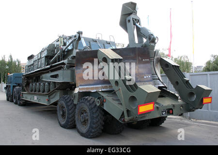 An old Soviet Armored troop-carrier on the street Armoured personnel carrier Stock Photo