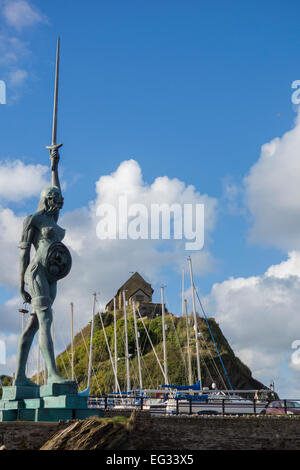 The Verity Statue by Damien Hirst rising over the harbour of Ilfracombe, Devon, England. Stock Photo