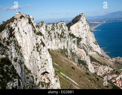 Sheer white rock mountainside the Rock of Gibraltar, British territory in southern Europe Stock Photo