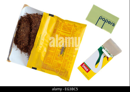 pouch of cigarette hand rolling tobacco with papers and filters on a white background Stock Photo