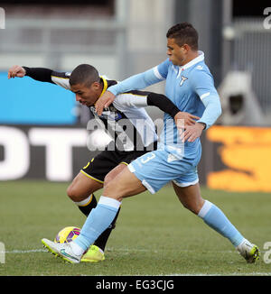 Udine, Italy. 15th Feb, 2015. Udinese's midfielder Marques Loureiro Allan (L)fights for the ball with Lazio's defender Mauricio during the Italian Serie A football match between Udinese and Lazio on Sunday 15 February 2015 at Friuli Stadium. Credit:  Andrea Spinelli/Alamy Live News Stock Photo