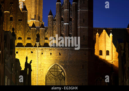 St. Mary's Basilica monumental facade viewed from the Mariacka street at night, Gdansk, Poland. Stock Photo