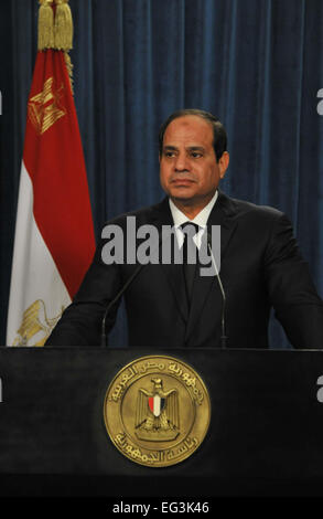 Cairo, Egypt. 15th Feb, 2015. Photo released by Egyptian state-run news agency MENA shows Egyptian President Abdel Fattah al-Sisi delivers a TV speech after an urgent convention of National Defense Council in Cairo, Egypt, on Feb. 15, 2015. Egyptian President Abdel Fattah al-Sisi said early Monday that his country reserves the right to respond at the proper time to the killing of 21 Coptic Egyptians in Libya by Islamic State (IS) group. Credit:  MENA/Xinhua/Alamy Live News Stock Photo