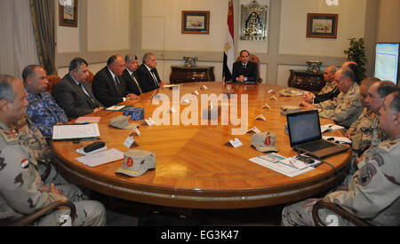 Cairo, Egypt. 15th Feb, 2015. Photo released by Egyptian state-run news agency MENA shows an urgent convention of National Defense Council is held in Cairo, Egypt, on Feb. 15, 2015. Egyptian President Abdel Fattah al-Sisi said early Monday that his country reserves the right to respond at the proper time to the killing of 21 Coptic Egyptians in Libya by Islamic State (IS) group. Credit:  MENA/Xinhua/Alamy Live News Stock Photo