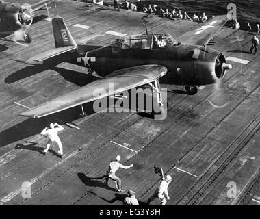 US NAVY GRUMMAN TBF AVENGER of Torpedo Squadron VT-8 about to launch from USS Bunker Hill for a rocket strike against Saipan island in the Marianas in June 1944. Photo US Navy Stock Photo