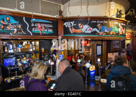Rugby fan at bar inside The Misty Moon pub / public house / tavern. Twickenham UK; popular with Rugby fans on match days Stock Photo