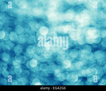 Abstract background made of water reflection bokeh circles. Stock Photo