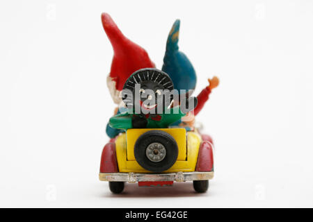 Noddy driving his car with Big Ears and Golly sitting in the back. Stock Photo