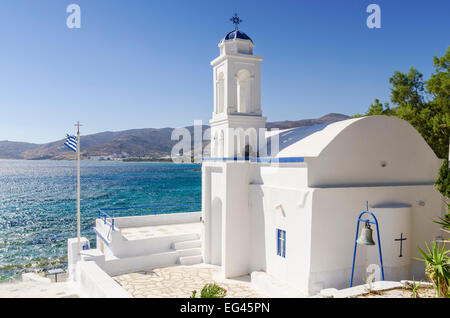 The small whitewashed church of Ayios Markos at Stavros beach on Tinos Island, Cyclades, Greece Stock Photo