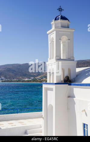 Belfry of small whitewashed church of Ayios Markos at Stavros beach on Tinos Island, Cyclades, Greece Stock Photo