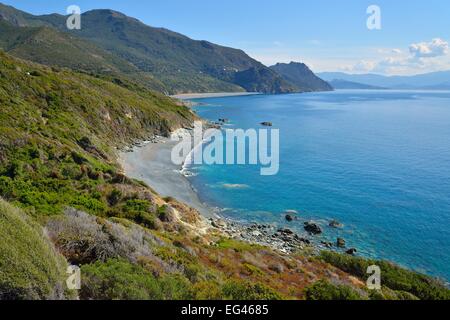Lonely pebble beach on the west coast of Cap Corse, at Nonza, Haute-Corse, Corsica, France Stock Photo