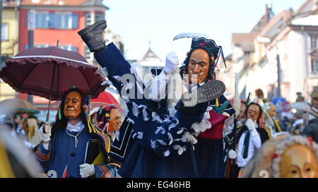 Rottweil, Germany. 16th Feb, 2015.  A 'Federahannes', a jester figure from Rottweil, is doing the 'Narrensprung' (lit. jester jump) in Rottweil, Germany, 16 February 2015. About 4000 jesters paraded through the city among thousands of spectators. The Rottweil Narrensprung is the highlight of the Swabian-Alemannic Fastnacht and one of the traditional pre-Lenten carnival parades in the South-West. Photo: Patrick Seeger/dpa/Alamy Live News  Stock Photo